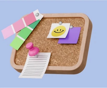 Pinboard with a smiley note and paint swatches