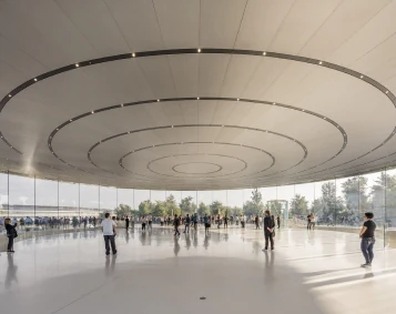 Crowd under the curved ceiling of a large atrium