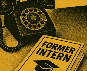 Rotary phone beside a book titled Former Intern
