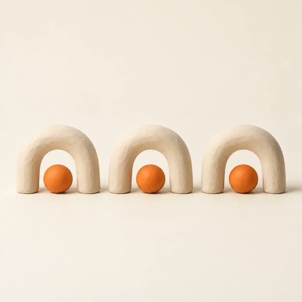 Three identical clay arches in a row